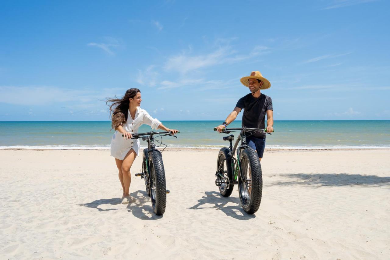 Carmel Cumbuco Resort Exterior foto Biking at the beach